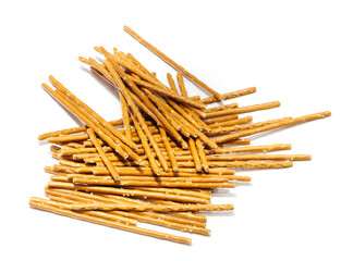 A pile of long, thin sweet or salty ready-to-eat breadsticks like straws isolated on a white background
