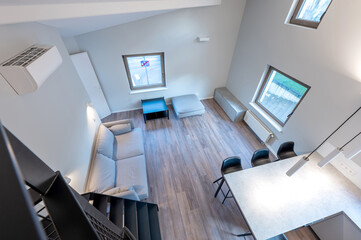 Modern Luxury Home Loft Apartment Kitchen Interior with Stylish Mezzanine and Minimalist Design