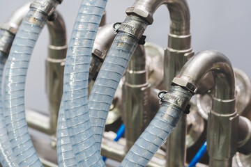 Food production machine with stainless steel pipes, cooling radiator as separator and tanks, valves and measuring instruments