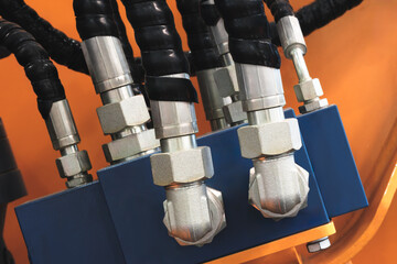 Hydraulic power drive hoses of high pressure machine, industrial power concept background.