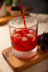 Hibiscus cooler. In Mexico, known as Agua de Jamaica, an infusion made from the hibiscus flower (Hibiscus sabdariffa), which is said to have multiple health benefits. It can be enjoyed hot or cold.