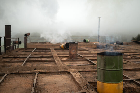 Smoke rising from chimneys in charcoal factory