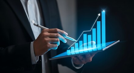 Business professional analyzing glowing financial growth chart on digital tablet touchscreen