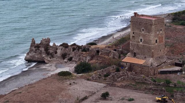 Aerial drone view of Campofelice di Roccella, a charming Sicilian seaside village in northern Sicily, Italy, showing traditional holiday homes, coastline, and panoramic Tyrrhenian Sea vistas