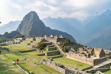 Machu picchu ancient inca city ruins with llama © Peruphotoart