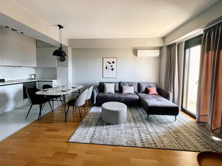 Modern Living Room Design Featuring Stylish Furniture, Elegant Décor, and a Cozy Atmosphere Ideal for Relaxation and Entertaining Guests