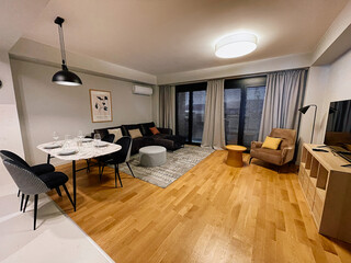 Modern Living Space with Stylish Decor, Open Layout, and a Cozy Atmosphere Perfect for Entertaining or Relaxing in Comfort and Elegance