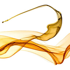 Flowing, golden liquid splashes gracefully across a black background in elegant curves