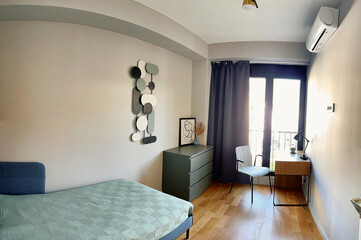 Stylish and Modern Bedroom Design Featuring Minimalistic Decor and Functional Furniture for a Cozy Living Space