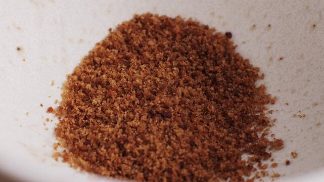 Ashwagandha Indian Ginseng Powder in White Bowl isolated on white background, superfood close up. 