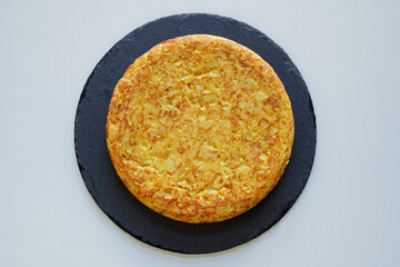 Homemade Spanish omelette (tortilla de patatas) seen directly from above
