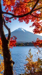 Autumnal view of Mount Fuji through vibrant foliage