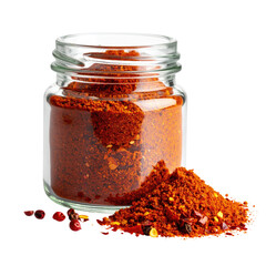 A transparent jar overflowing with vibrant red spice, a small pile spills outside