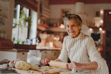 Grandmother preparing homemade cookies with love.