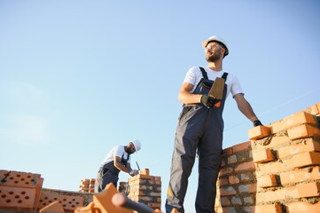 Concept of commercial construction of offices. The construction team is building the office center building