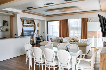 Modern Living Space with Elegant White Furniture, Spacious Design, and Natural Light Highlighting Contemporary Decor Elements