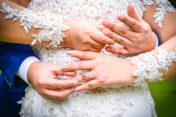 Couple exchanging wedding rings during marriage ceremony