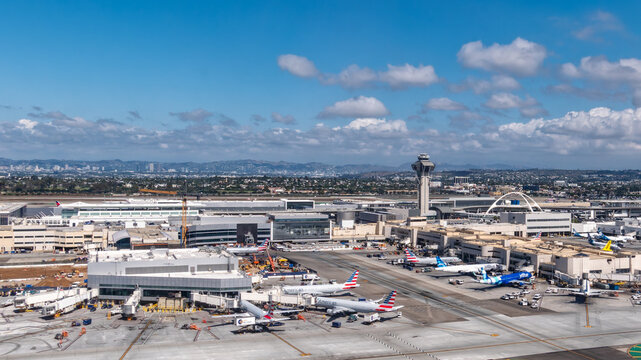 Los Angeles, CA - Oct. 3, 2025: Los Angeles International Airport (LAX) viewed from above with The Theme Building and Air Traffic Control Tower in view.