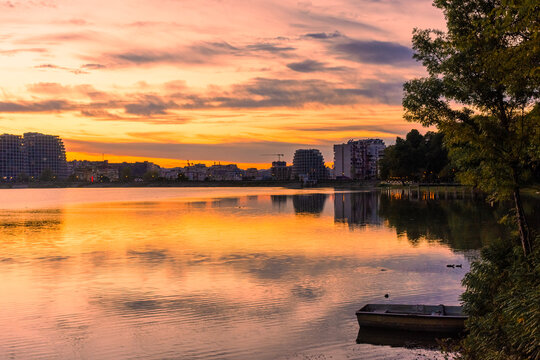 Sunset over the Parku i Madh Lake in the Grand Park of Tirana,  Albania