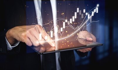A business professional evaluates financial data using a tablet, showcasing dynamic graphs and growth trends in a modern office setting. Impute