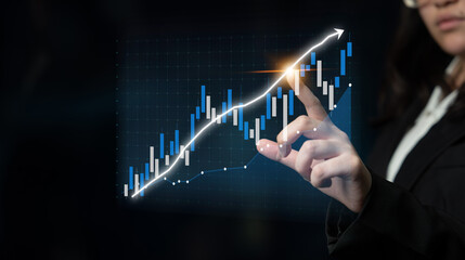 A business woman engages with a futuristic touch screen displaying growth charts, symbolizing financial advancement and market analysis in a professional setting. Impute