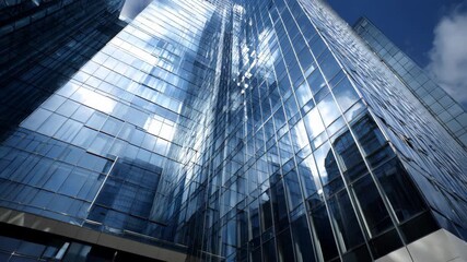 Close perspective on a contemporary office buildings glass facade integrating innovative energyefficient materials with dynamic light reflections and clean structural forms.