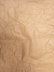 Wrinkled brown kraft paper texture background full frame