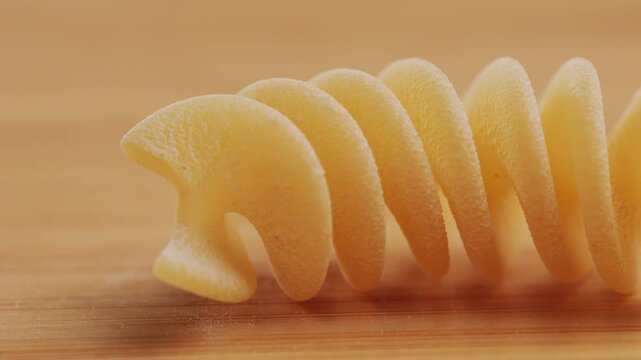 Pasta mix, different Italian tagliatelle fussili pasta packaging window, Fettuccine pasta, close up, not cooked