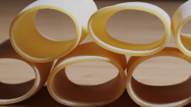 Italian pasta Paccheri, Cannelloni type of pasta in the shape of a very large tube, originating from Campania