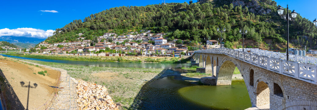 Historical Ottoman Houses in neighborhoods Gorica and Mangalem in Berat, with bridges over river Osum, Albania.