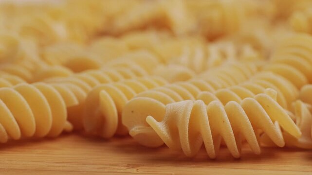 Pasta mix, different Italian tagliatelle fussili pasta packaging window, Fettuccine pasta, close up, not cooked