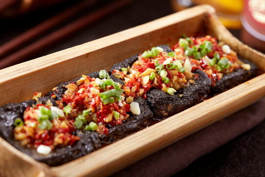 Close-up of a side dish, stinky tofu