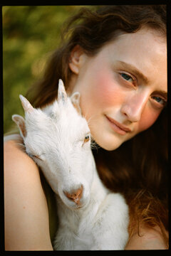 Posing with goat