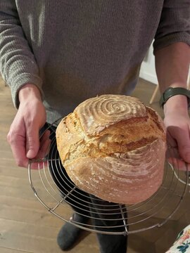 artisan bread presented on cooling rack for perfect crust