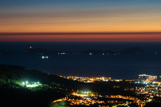 Landscape with orange sky and the C&iacute;es Islands, Vigo, Galicia, Spain
