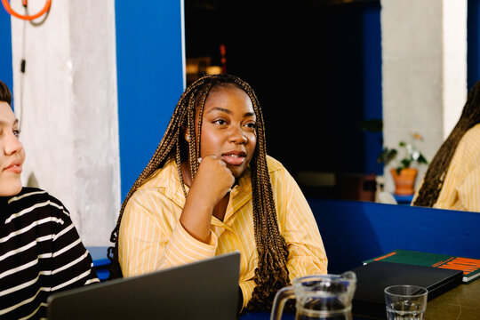 Biverse black woman attending a meeting with female entrepreneurs