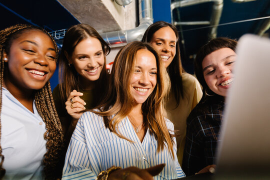 Female colleagues attending an informal virtual meeting