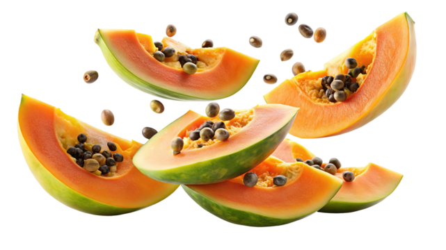 Freshly sliced ripe papaya fruit pieces with seeds floating in the air isolated on transparent background