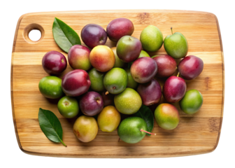 A vibrant assortment of fresh green and purple olives artfully arranged on a rustic wooden cutting board isolated on transparent background