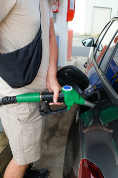 Vehicle Being Refueled at Petrol Station