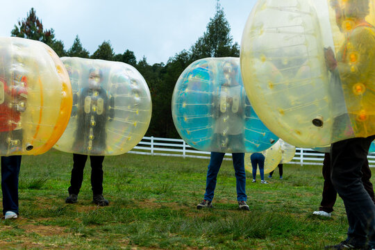 Tourists playing bumper balls in zacatlan, puebla, mexico