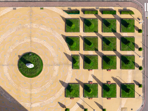 Aerial View of Geometric Plaza with Green Planters