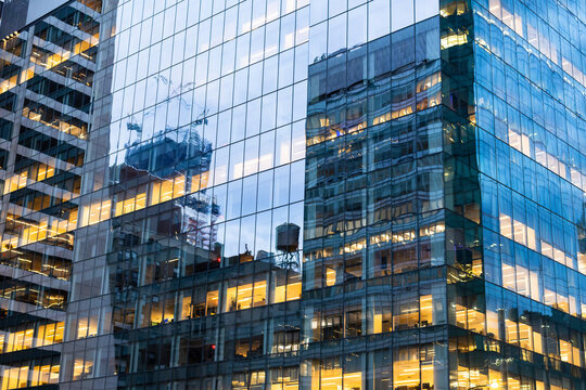 Reflection of construction side on building in NYC