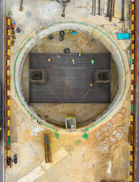 Aerial View of Circular Construction Site with Steel Reinforceme