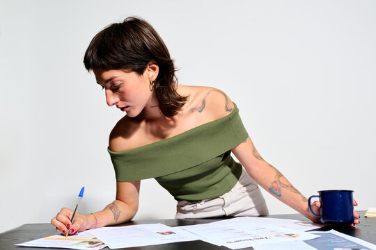 Writing notes in the business office