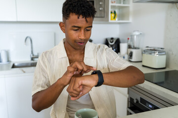 man using smartwatch