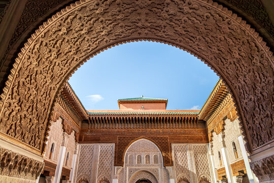 Ornate Islamic architecture inside Marrakesh madrasa
