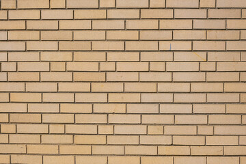 beige brick wall texture with clean horizontal lines, creating a simple geometric pattern ideal for architectural backgrounds or design use.