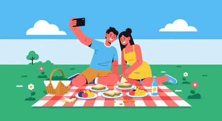 Cheerful Couple Enjoying Picnic with Food and Taking a Selfie Outdoors on a Sunny Day