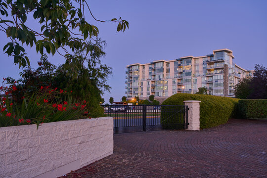 Modern Condo Building with Garden at Dusk, Sidney, Vancouver Island